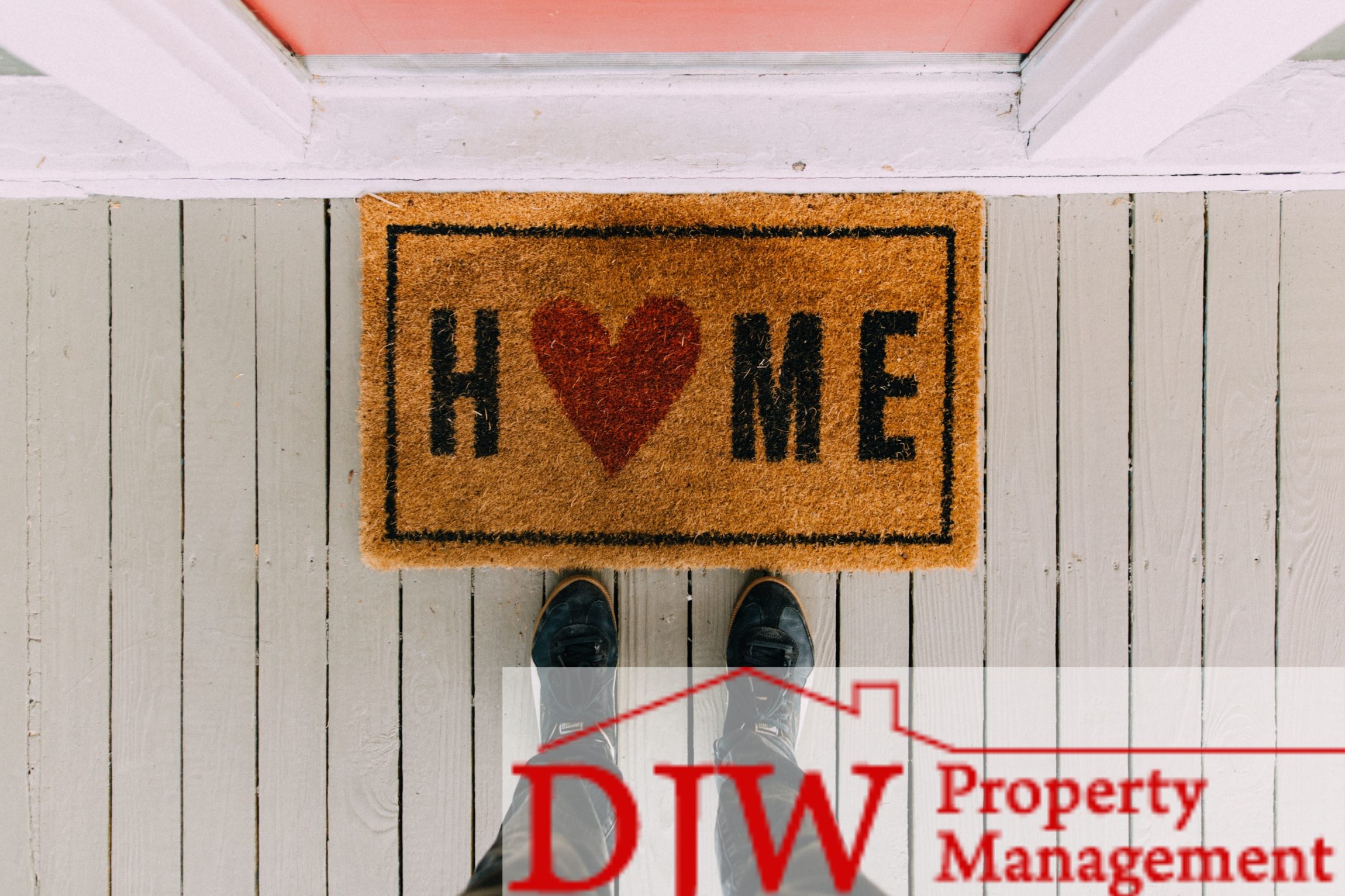 Doormat that says ‘home’ with a red heart